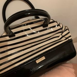 Kate Spade. Black striped purse